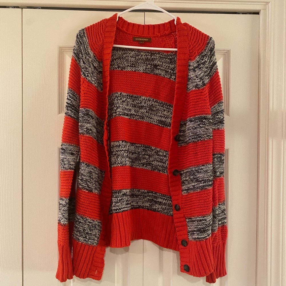 Red, black and white cardigan